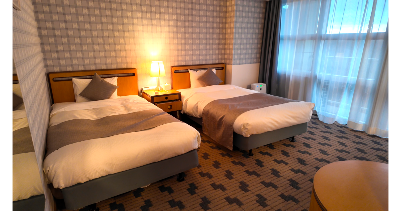 TAOYA日光霧降の客室ベットの様子